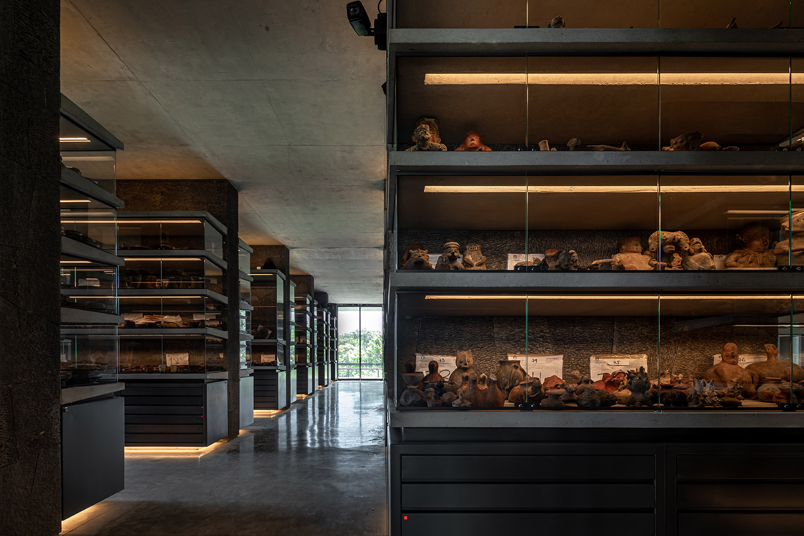 A new repository contains concrete shelves and drawers to display and store thousands more Credit:Onnis Luque