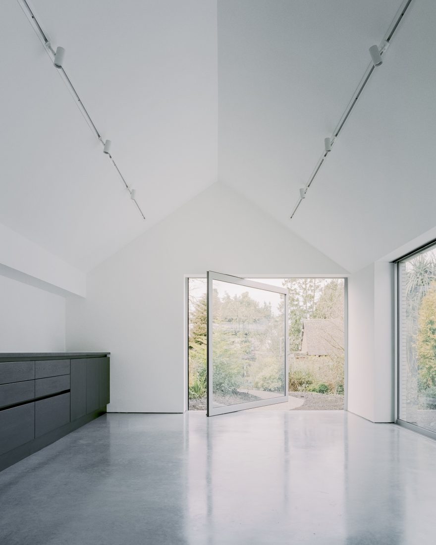 Over the edge pivoting doors