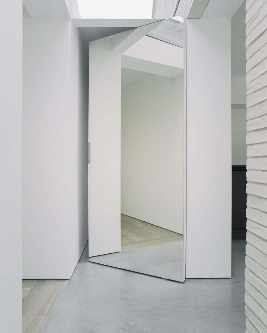 Over the edge pivoting doors